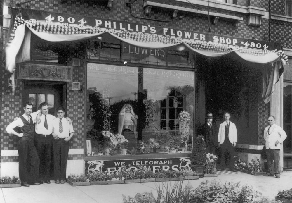 James A. Phillip (far right) with with brothers and friends in front of the flower shop in Cicero
